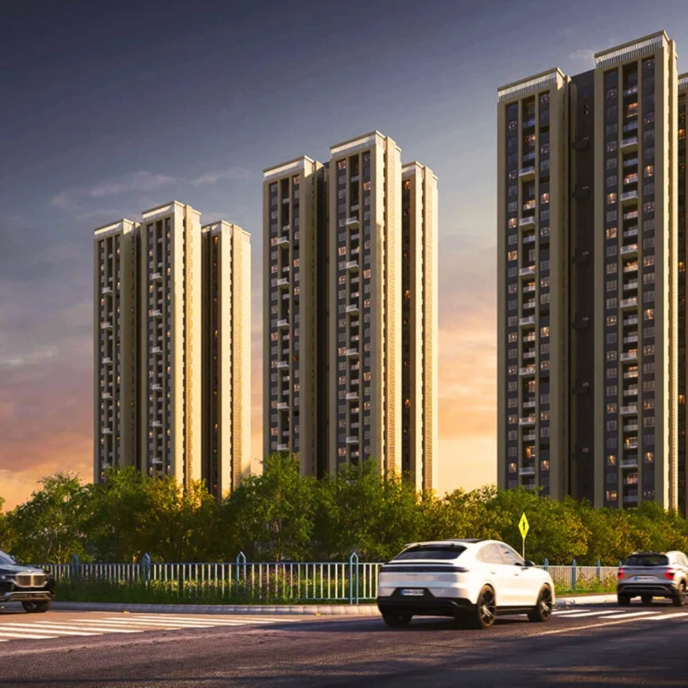 Ambuja Utpalaa residential towers off EM Bypass at sunset